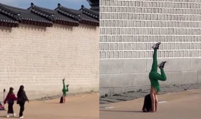 韩媒：越南一女子在首尔景福宫穿紧身衣练瑜伽引韩网民不满<strong></p>
<p>知乎币圈</strong>，当事人回应